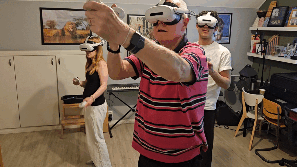 Three people playing virtual reality games